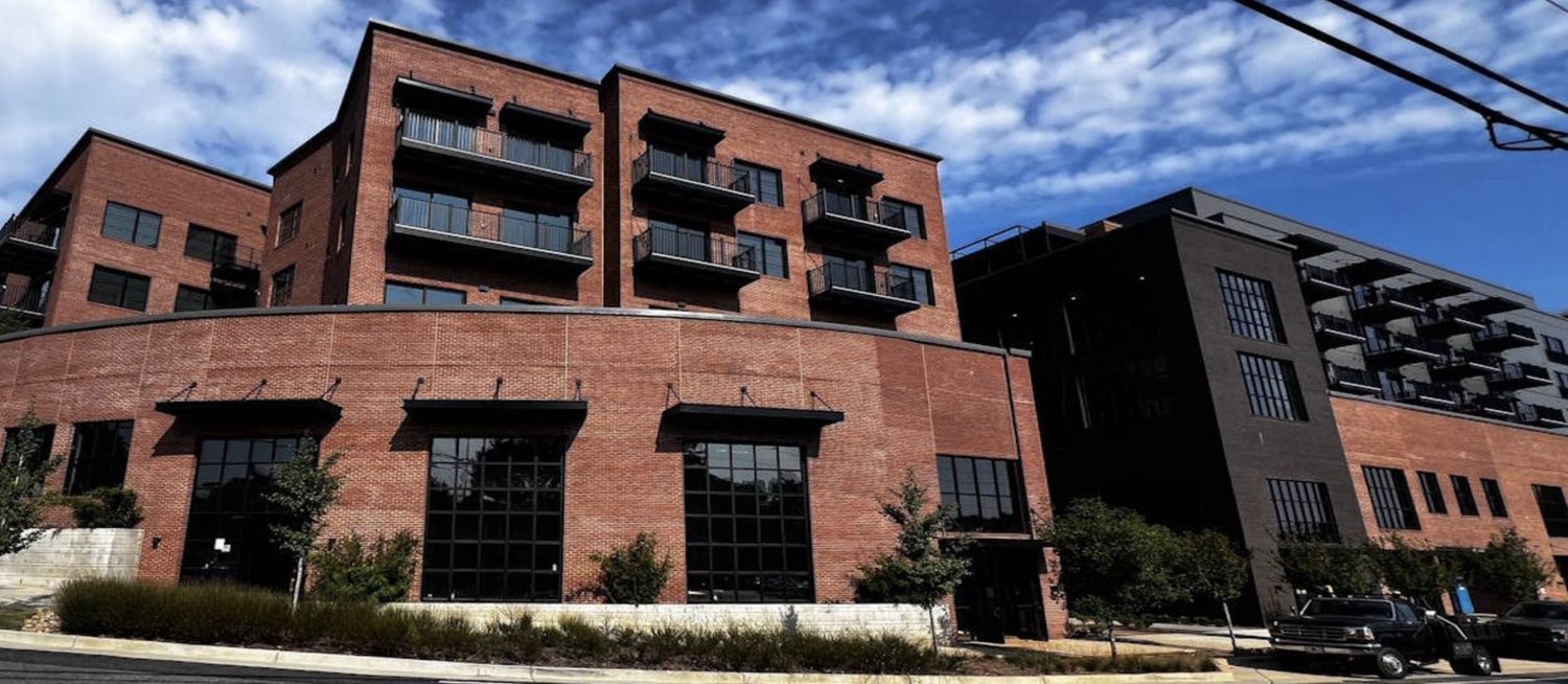 Urban brick mixed-use building with balconies
