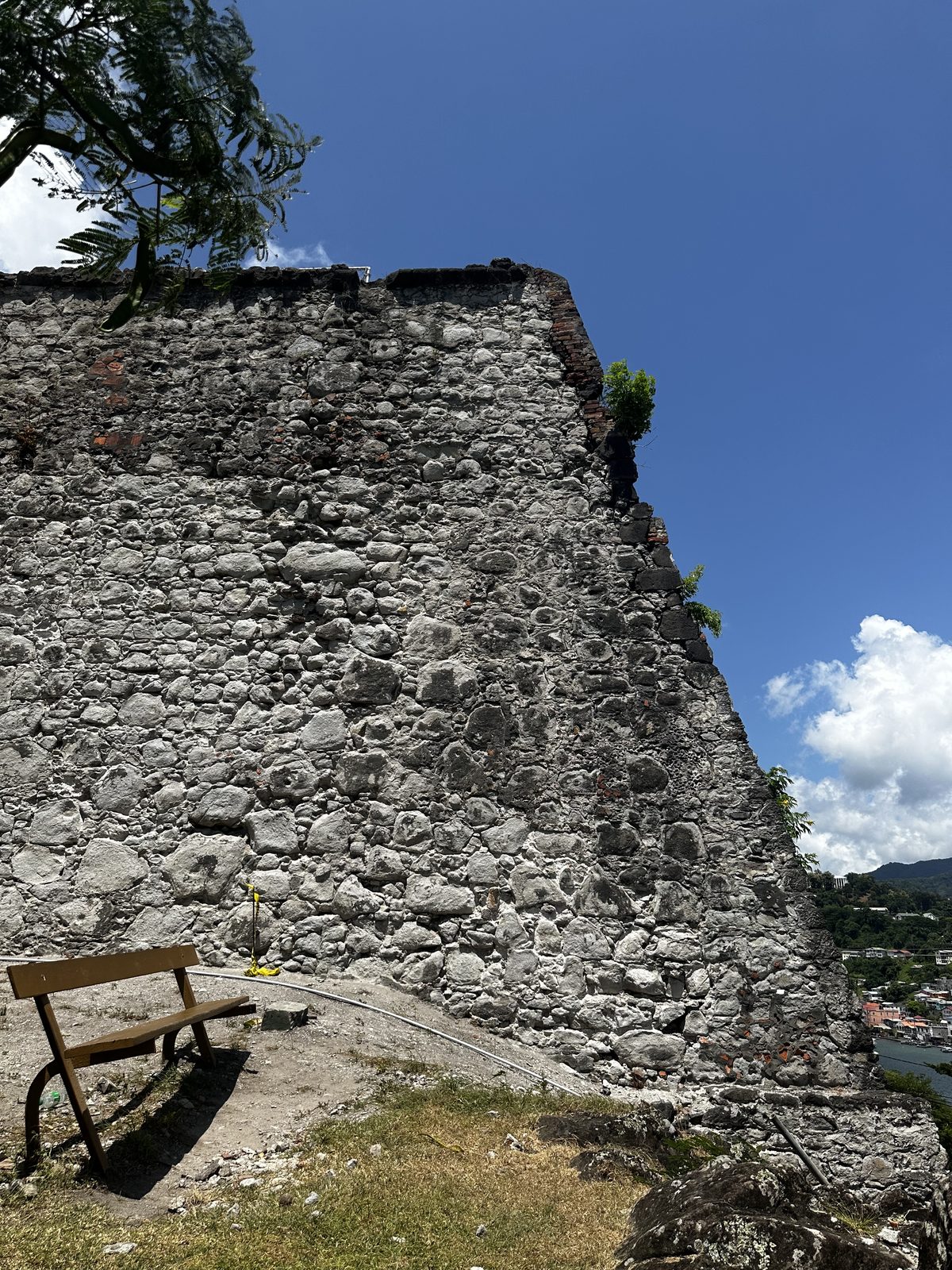 Historic exterior stone wall under rehabilitation