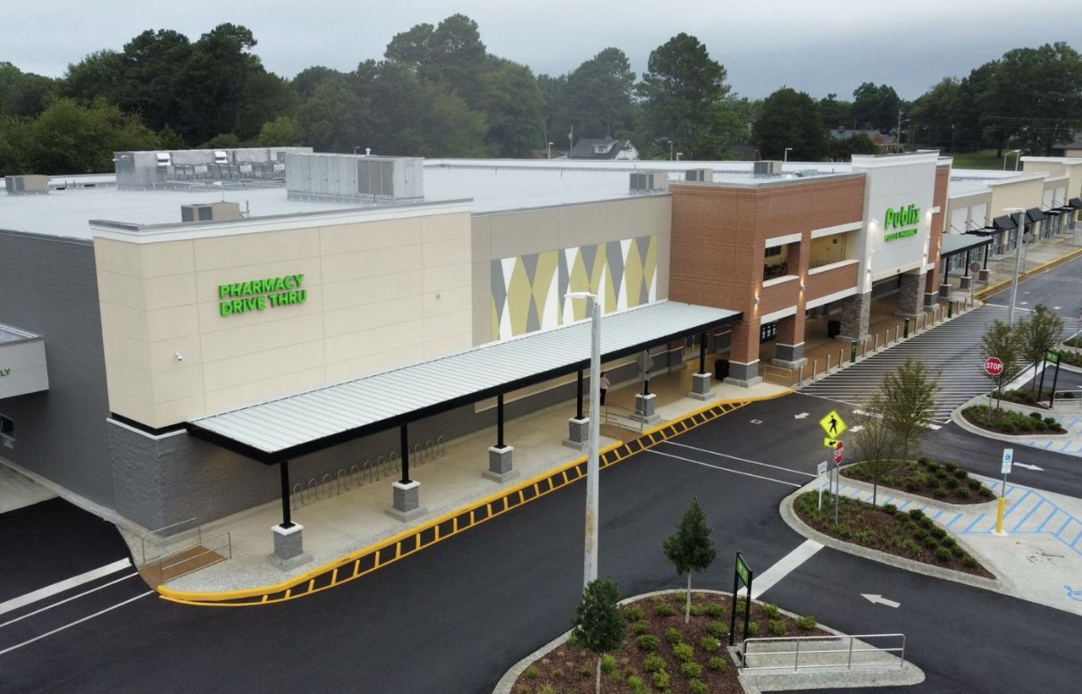 New Publix grocery store canopy and retail building, aerial view
