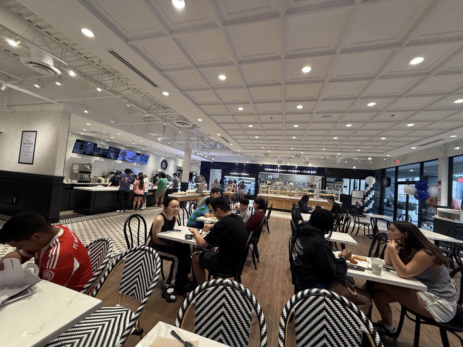 Paris Baguette café full of customers on opening day